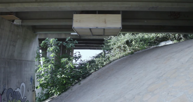 Guy Secretly Builds a Studio Apartment Under a Bridge | video showing a hidden studio suspended under a bridge