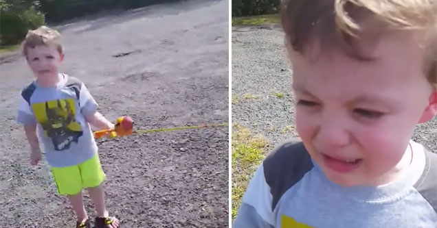 little kid has his fish taken by a snake