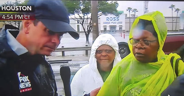 fox news reporter interviewing woman fleeing tropical storm harvey