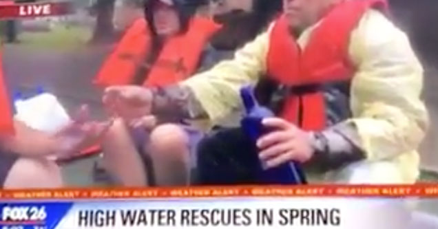 survivors of hurricane harvey seen taking shots of vodka on a rescue boat