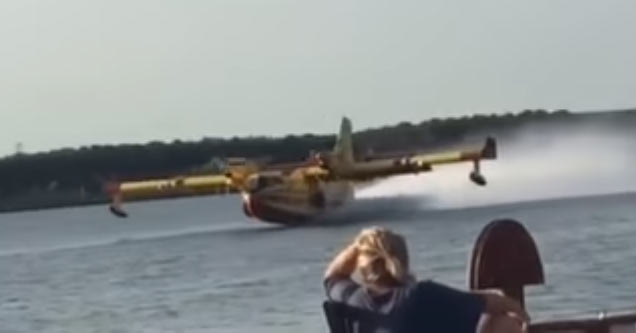 Canadair Water Tanker Hits Boat While Refilling