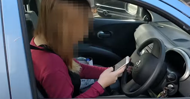 Guy Hilariously Trolls Drivers On Their Phones