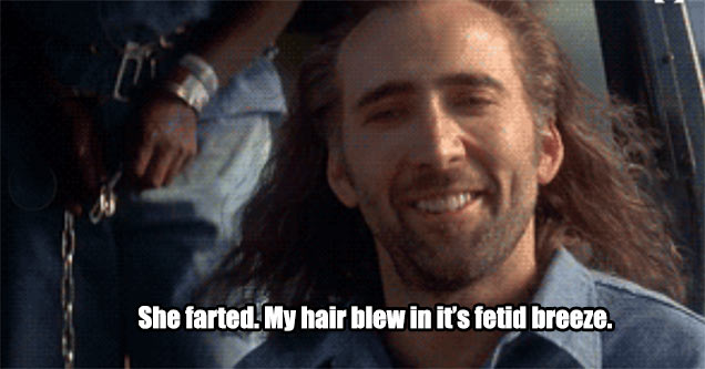 nicolas cage hair blowing in the fetid breeze