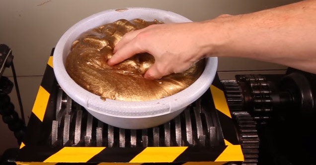 Guy Shreds A 15 Pound Blob of Gold Slime