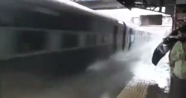 Train Plows Through Flooded Station Soaking Everyone In Its Path