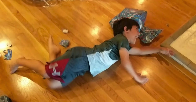 Kid Freaks The Hell Out After Opening Nintendo Switch Birthday Gift