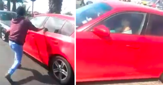 person chasing a red car