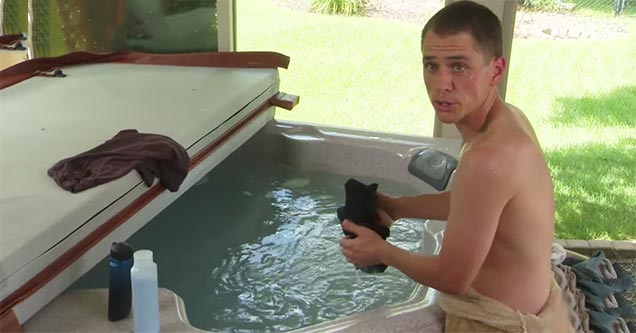 washing clothes in the old hot tub