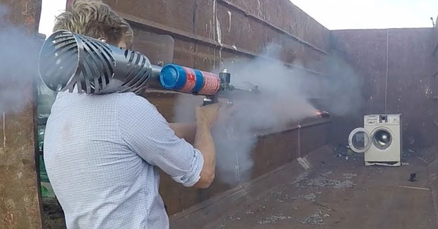 Guy Fires Rockets At A Washing Machine And It Just Won't Die