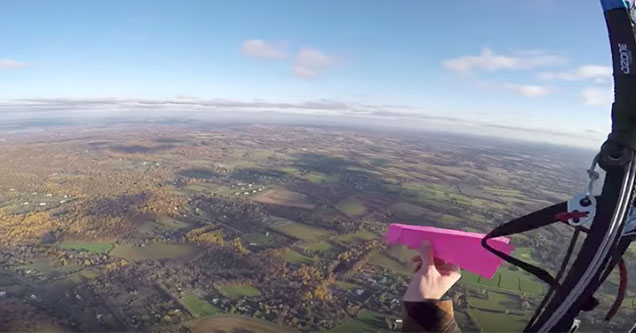 throwing paper airplanes from 2,000 feet up