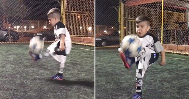 little guy juggles soccer ball