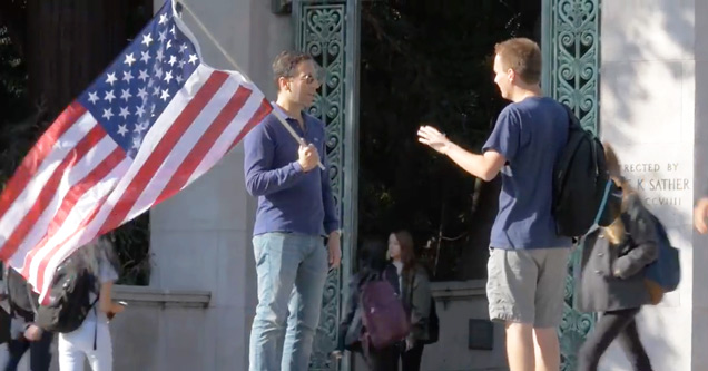 guy with american flag on Berkeley campus