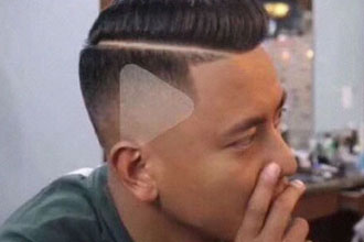 When a man in China showed his barber what kind of haircut he wanted. The barber took things a little to literally. The play button was still seen on the screen so the man ended up with one on the side of his head.