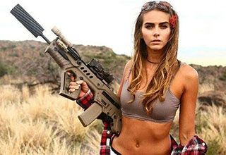 Every woman needs an AR-15 to complete their summer look. 