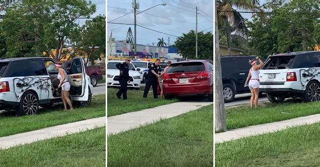 Woman Smashes And Spray Paints A Brand New Range Rover Before Being