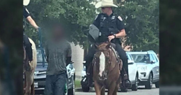 Photos of Texas Police on Horses Leading Handcuffed Black Man on a Rope Has Sparked Outrage