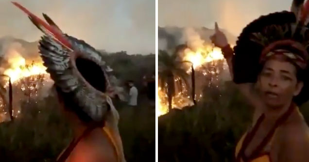 Indigenous Woman cries as she watches the Amazon burn behind her Indigenous Woman cries as she watches the Amazon burn behind her