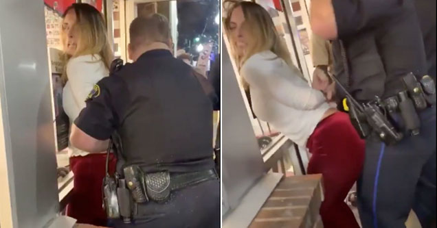 woman getting arrested white intoxicated rubs her backside erotically towar...