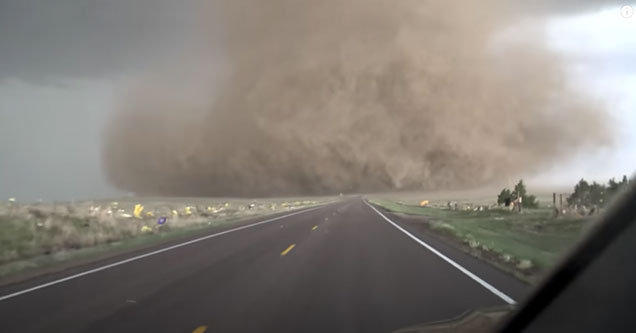 storm chasers film tornado from extremely close up