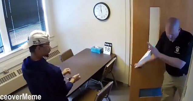 a handcuffed man in a police interrogation room