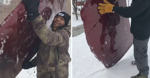 guy sledding on the hood of his car