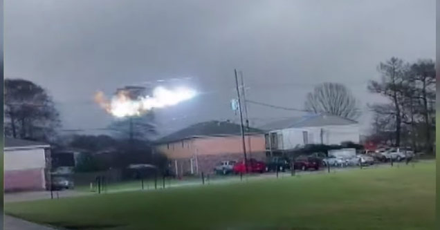 a fireball of electricity moving across frozen power lines