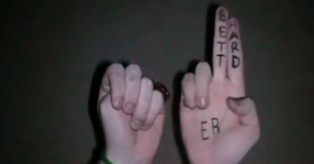 Two hands with words drawn on them doing the song harder better faster stronger