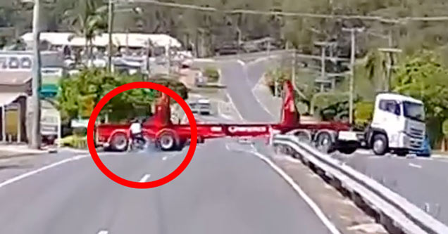 Red circle around a speeding motorcycle about to crash into the back of a truck