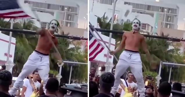 florida man dressed as joker waving american flag saying covid is over