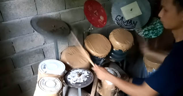 drummer plays 'tom sawyer' by rush on homemade kit