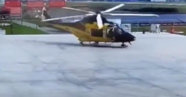 a helicopter preparing for takeoff