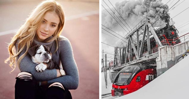 a gorgeous woman holding a small dog and a red train and white snow