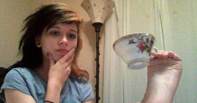 Girl holding Teacup with foot