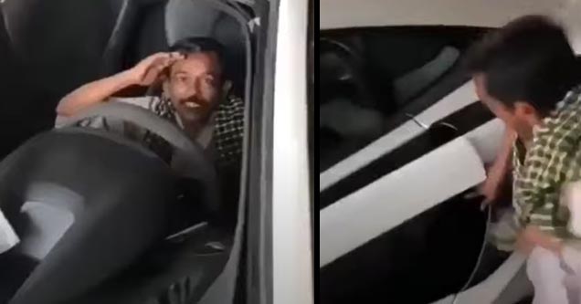 a guy slamming his hand in the car door