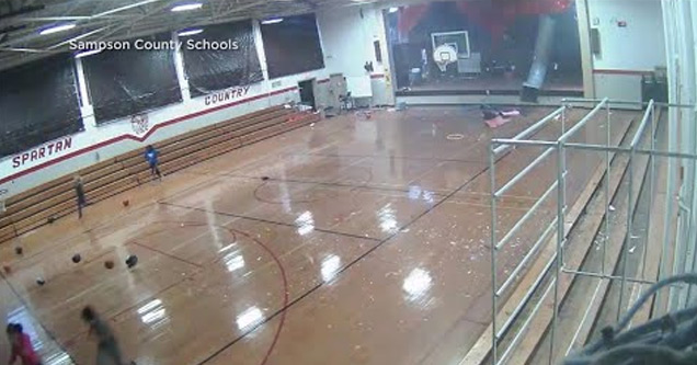 a microburst in north carolina blows a wall out of a gym