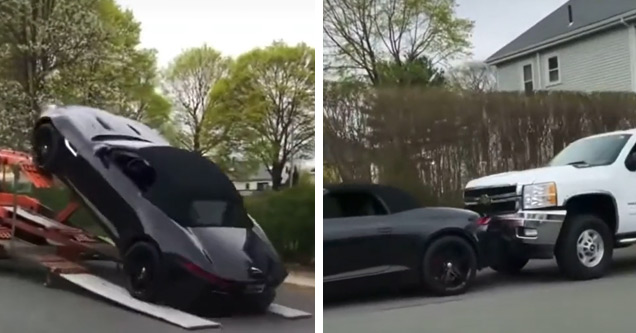 a jaguar f-type falling off the back of a car hauler