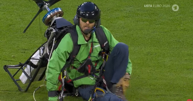 a paraglider who crash landed on the soccer field