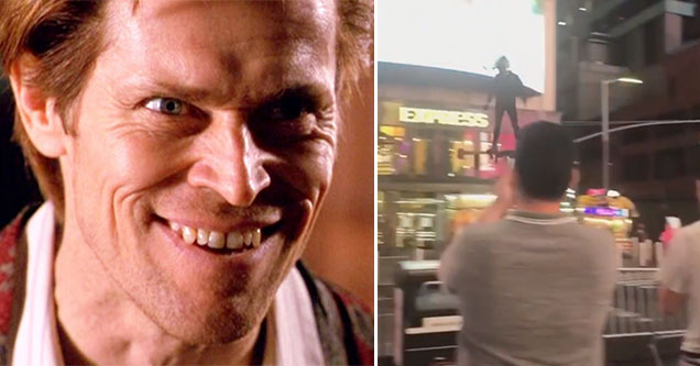 Willem Dafoe as the Green Goblin and a man riding a helicopter hover board through NYC's Times Square