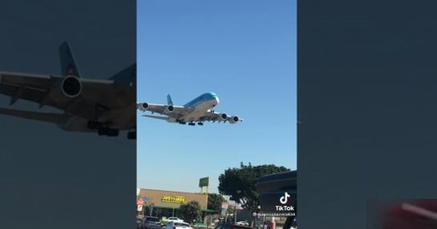 huge airplane coming into land