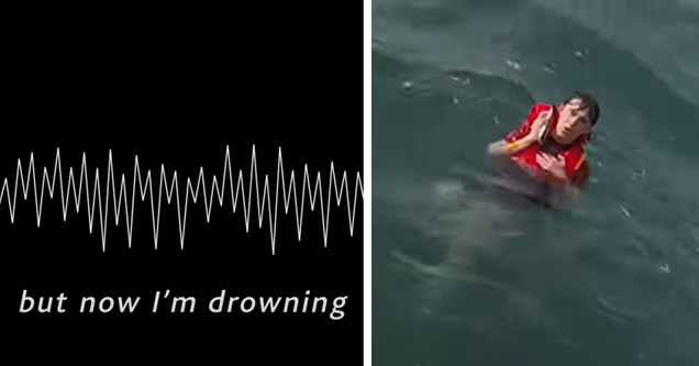 a young man in the ocean wearing a life vest on his phone