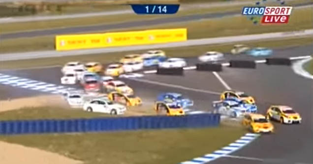 race cars crashing into poorly designed corner at start of track