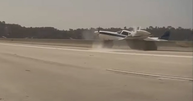 dash cam video of a small plane crash landing on I 5