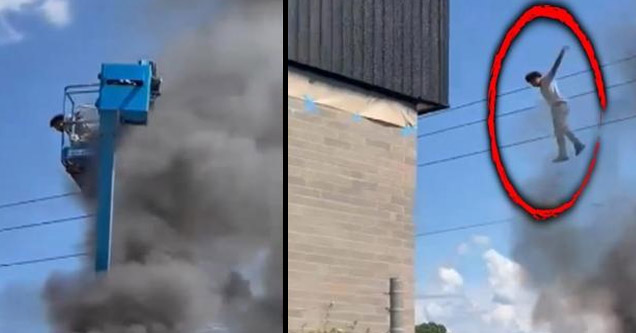 a man jumping from a boom lift thats on fire