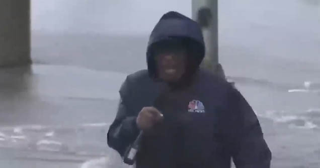 Al Roker reporting live during Hurrican Ida