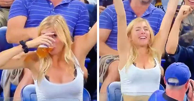 Attractive lady chugs beer at US Open