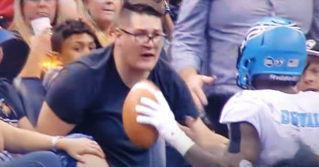 a fan getting ejected for grabbing a player				           fan ejected arena football dumb move instant karma idiot owned guy ejected football player