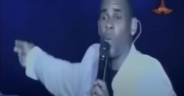 R Kelly in Ethiopia singing a song trying to recruit women to follow him to America				           kelly ethiopia recruitment r kelly r kelly ethiopia recruitment video recruitment song r kelly singing in ethiopia wtf r kelly r kelly convicted