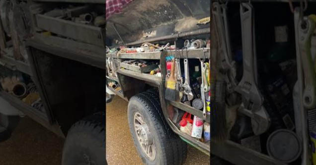 handyman has tool compartment built into his truck.