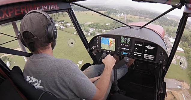 a man flying an ultralight plane