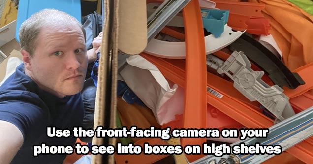 a life hack about using your camera on the phone to see in boxes on shelves